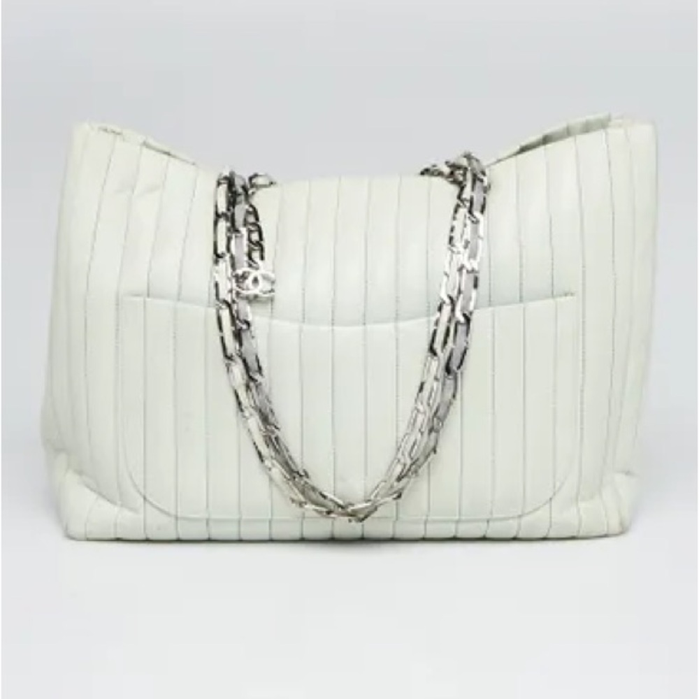 AuthenticCHANEL
Light Green Quilted Lambskin Leather Mademoiselle Giant Tote Bag